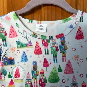 New without tags. Girls size 6/7 Nutctacker dress made in the USA